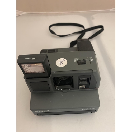 124 - A VINTAGE POLAROID IMPULSE CAMERA IN WORKING ORDER