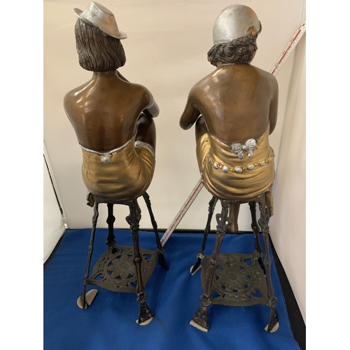 2 - AN IMPRESSIVE PAIR OF BRONZE ART DECO STYLE LADIES ON CAST METAL STOOLS