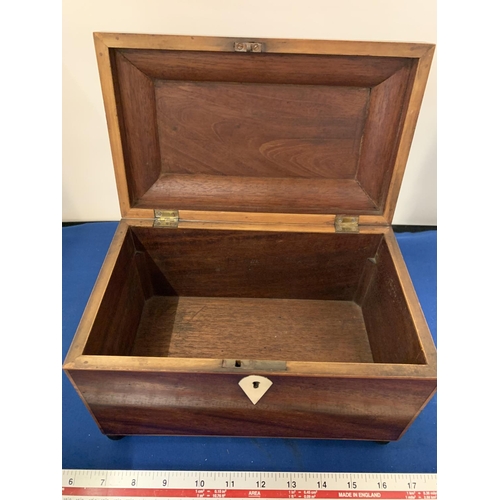 25 - AN INLAID WOODEN TEA CADDY BOX