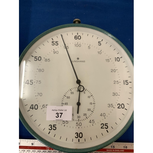 37 - A JUNGHAMS STOP WATCH STYLE CLOCK IN WORKING ORDER