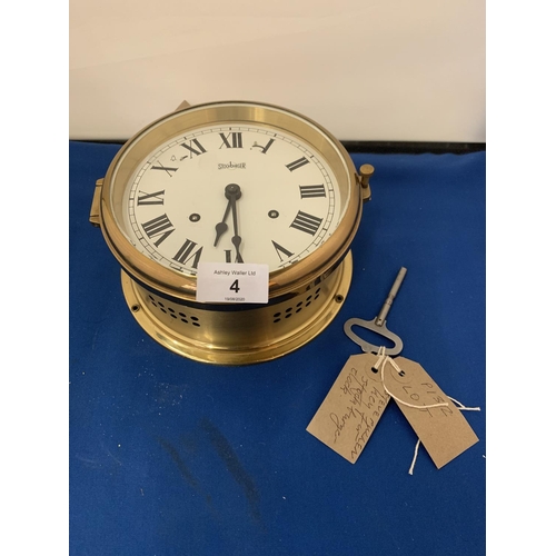 4 - A BRASS GERMAN STOCKBURGER MARITIME CLOCK WITH KEY