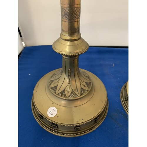 46 - TWO TALL BRASS ORNATE ALTER CANDLESTICKS