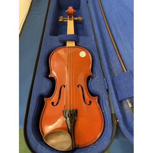 92 - A SMALL CASED VIOLIN