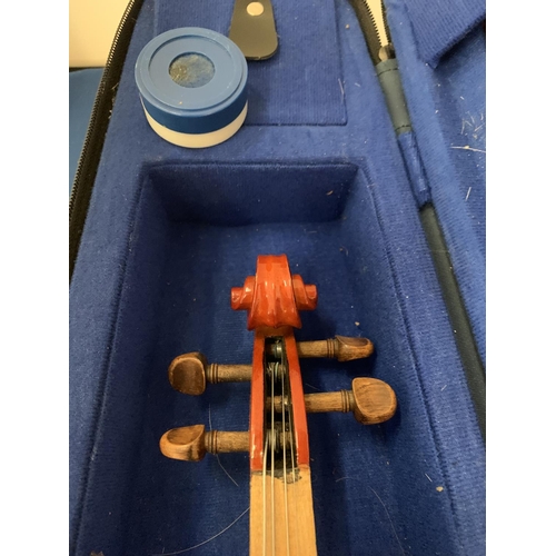 92 - A SMALL CASED VIOLIN