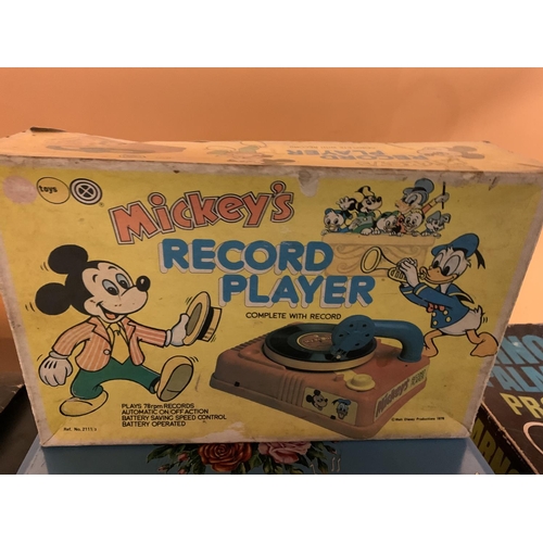 310 - A CHILDS PIANO AND A VINTAGE BOXED MICKEY MOUSE RECORD PLAYER