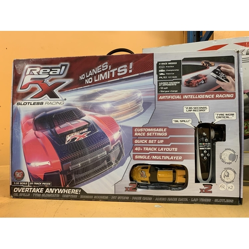 318 - A REAL FX SLOTLESS RACING CAR SET AND A MARIOCART SLOT RACING SYSTEM GAME