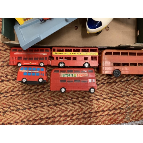 336 - A VINTAGE FISHER PRICE AIRPORT WITH PLANE AND FIVE FRICTION POWERED BUSES