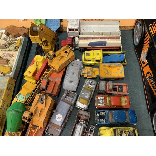 357 - A LARGE COLLECTION OF VINTAGE TOY VEHICLES TO INCLUDE CRANES, WAGONS, CARS ETC