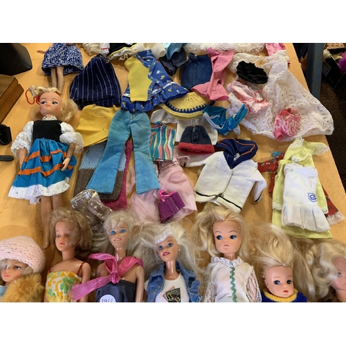 434 - NINE VINTAGE DOLLS SOME BARBIE WITH ACCESSORIES