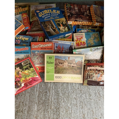 444 - A LARGE COLLECTION OF VINTAGE JIGSAWS, GAMES ETC