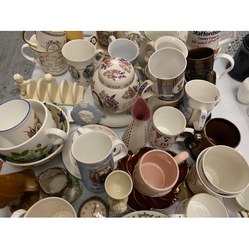 163 - A LARGE COLLECTION OF POTTERY TO INCLUDE MUGS, LURPACK TOAST RACK, GINGER JARS ETC