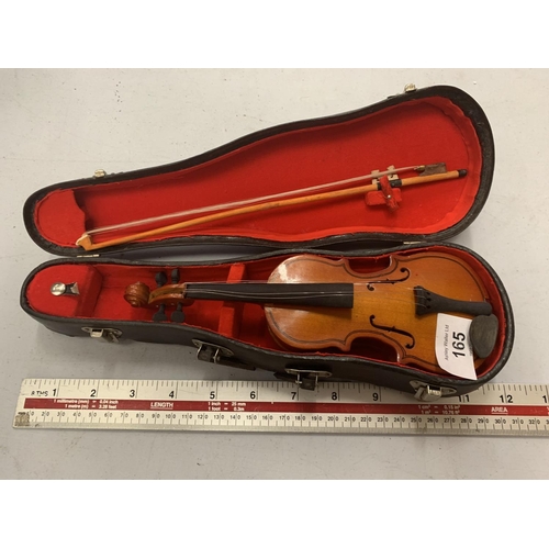 165 - A CASED MINIATURE VIOLIN