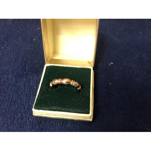 480 - A 9 CARAT YELLOW GOLD WEDDING BAND - 2.2 GRAMS, RING SIZE M