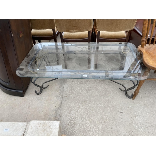 1857 - A GLASS TOP COFFEE TABLE