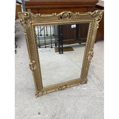 1861 - AN ELABORATE GILT FRAMED MIRROR