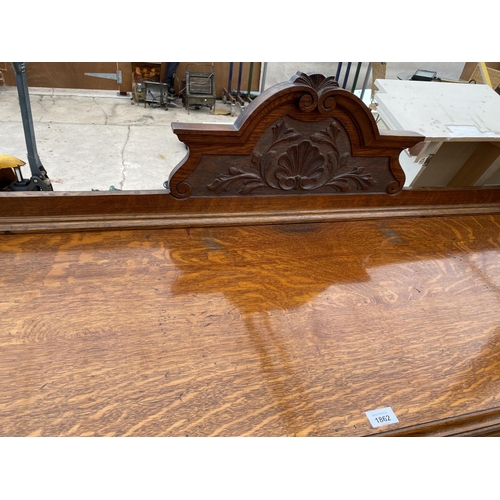 1862 - AN OAK SIDEBOARD WITH FOUR DOORS, TWO DRAWERS AND SPLASHBACK