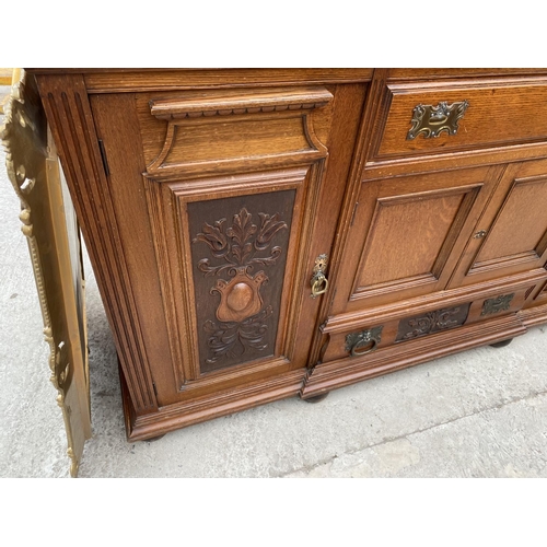 1862 - AN OAK SIDEBOARD WITH FOUR DOORS, TWO DRAWERS AND SPLASHBACK