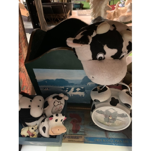 229 - A COLLECTION OF ITEMS TO INCLUDE COW RELATED ITEMS CLOCKS, MATS ETC