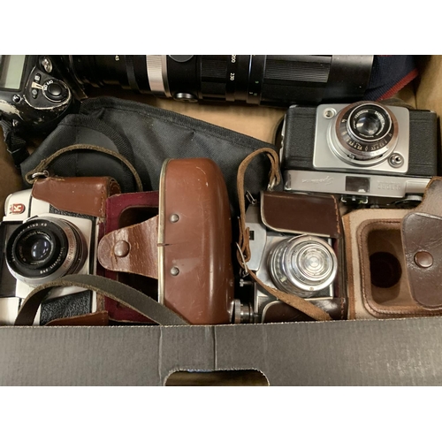 234 - A LARGE COLLECTION OF VARIOUS CAMERAS AND LENSES WITH CASES