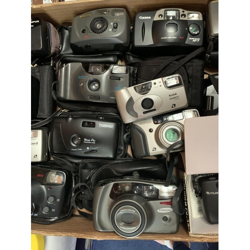 236 - A LARGE COLLECTION OF VARIOUS CAMERAS AND LENSES WITH CASES