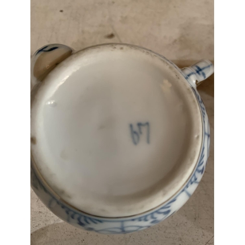 271 - AN ORIENTAL BLUE AND WHITE FEEDING CUP