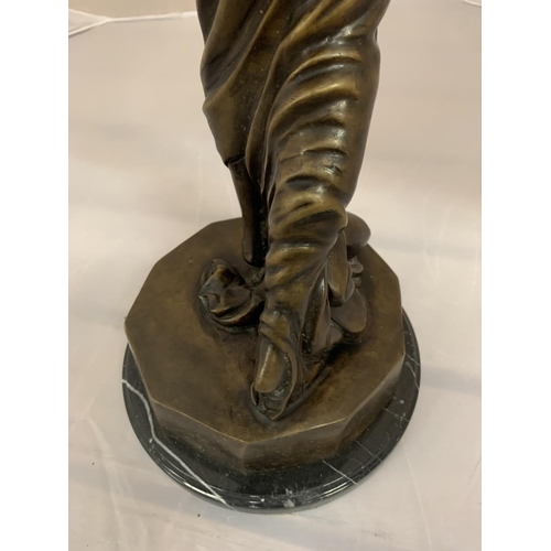 188 - A LARGE BRONZE FIGURINE OF A LADY ON A MARBLE BASE