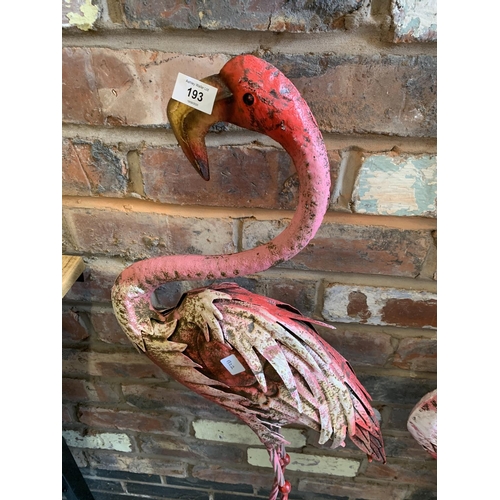 193 - A PAIR OF METAL PINK FLAMINGOS