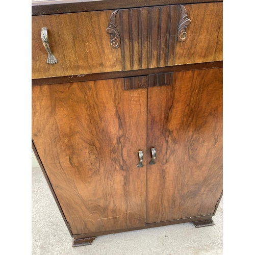 1860A - A WALNUT TALLBOY WITH TWO DOORS AND ONE DRAWER