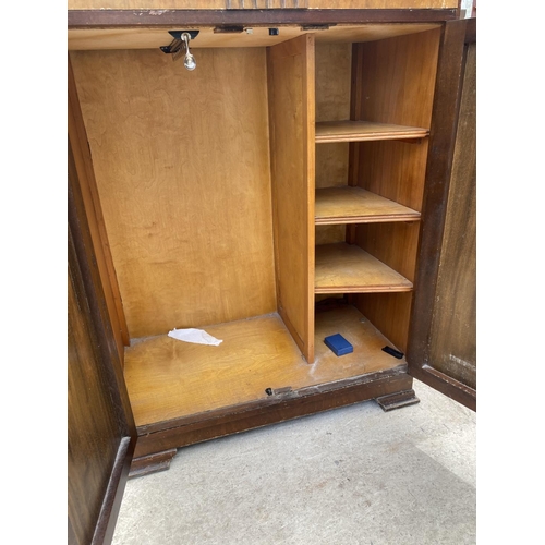 1860A - A WALNUT TALLBOY WITH TWO DOORS AND ONE DRAWER