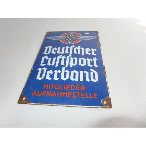 370 - AN ENAMEL SIGN WITH SWASTIKA DECORATION, 30cm x 20cm