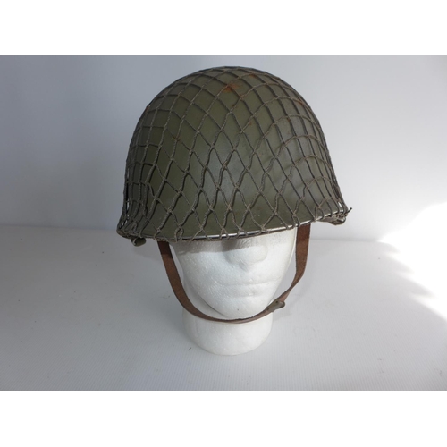 384 - A USA INFANTRYMAN'S HELMET AND LINER