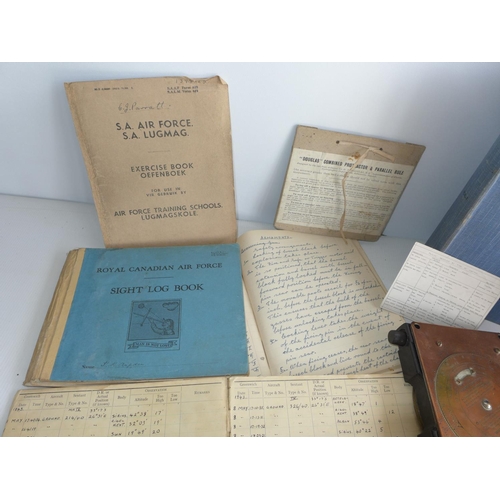 387 - A COLLECTION OF WORLD WAR II PERIOD FLYING LOGS AND MANUALS, TO INCLUDE ROYAL CANADIAN SIGHT LOG BOO... 