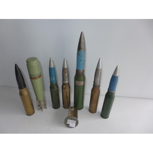 403 - A COLLECTION OF SIX INERT SHELLS TO INCLUDE AN OERLIKAN 35MM FROM THE FALKLANDS, PART OF A WWII GREN... 