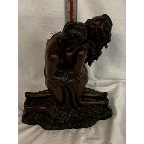 10 - A LARGE RESIN FIGURE OF A LOVING COUPLE