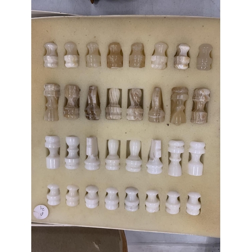 109 - A COMPLETE MARBLE CHESS SET