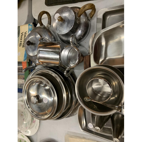 130 - A LARGE COLLECTION OF 1950s STAINLESS STEEL KITCHEN ITEMS