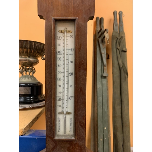 67 - A LARGE WOODEN BAROMETER