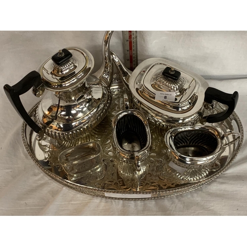 8 - A FIVE PIECE SILVER PLATED TEA AND COFFEE SET WITH MATCHING TRAY