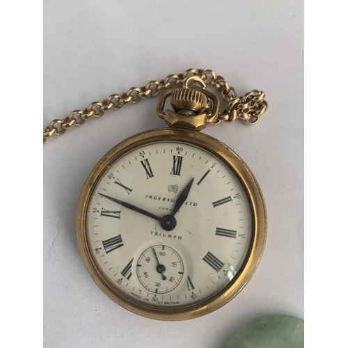 528 - A YELLOW METAL INGERSOL TRIUMPH POCKET WATCH, FOB AND CHAIN