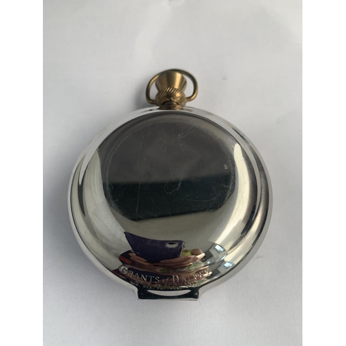 585 - A 'THE DALVEY ST ELMO' TRAVELLING ALARM CLOCK IN THE FORM OF A LARGE POCKET WATCH