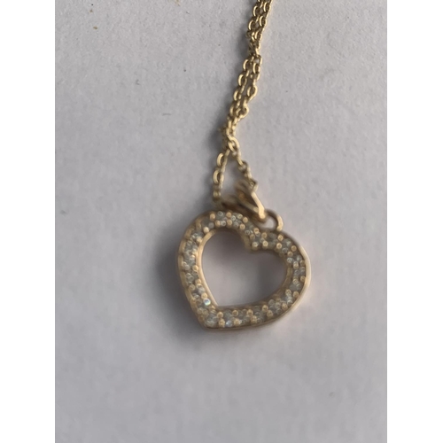 589 - A 9CT GOLD DIAMOND SET HEART PENDANT AND CHAIN, APPROX TOTAL GROSS WEIGHT 1.5 GRAMS