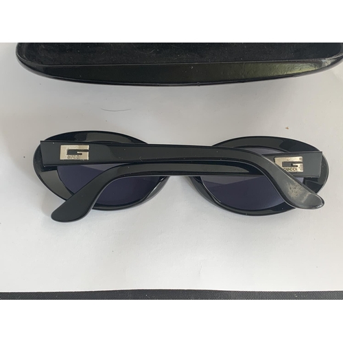 602 - A PAIR OF GUCCI SUNGLASSES WITH CASE