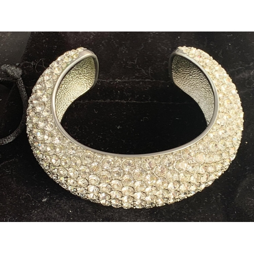 609 - A KAREN MILLEN HEAVY DIAMANTE BRACELET AND RING WITH VELOUR BAGS