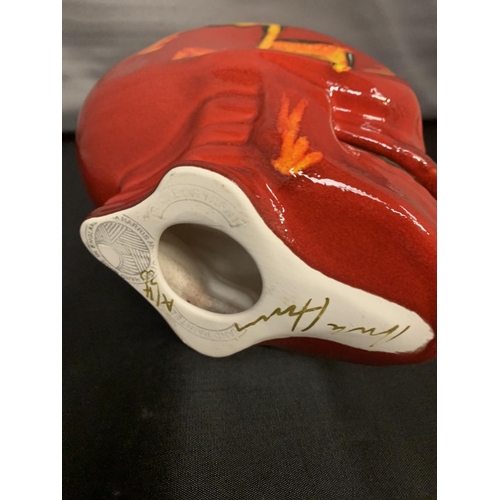 702 - A LARGE SIGNED HAND PAINTED ANITA HARRIS SKULL