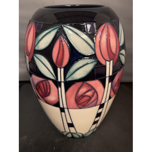 737 - A MOORCROFT KINGSBOROUGH GARDENS VASE 7 INCHES HIGH