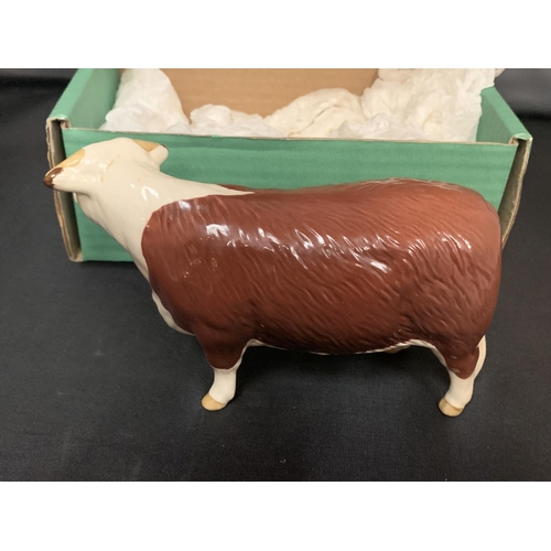 762 - A BESWICK HEREFORD COW WITH BOX