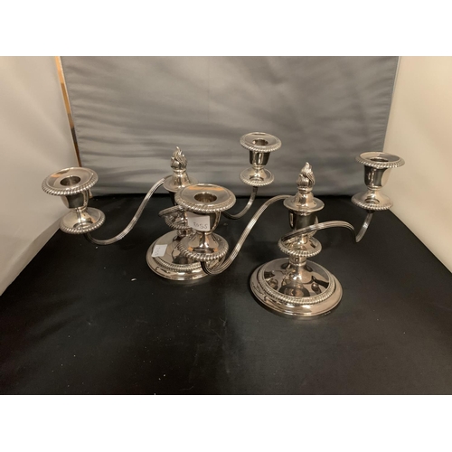 794 - A PAIR OF ORNATE SILVER PLATED CANDELABRAS