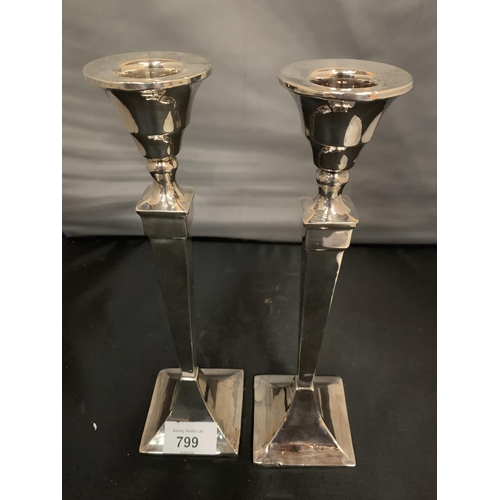 799 - A PAIR OF HALLMARKED (INDISTINCT) CANDLESTICKS