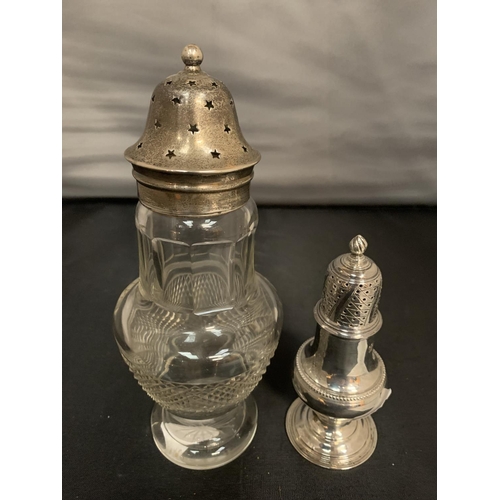 800 - A HALLMARKED SILVER TOPPED GLASS SUGAR SHAKER AND A PEPPER POT