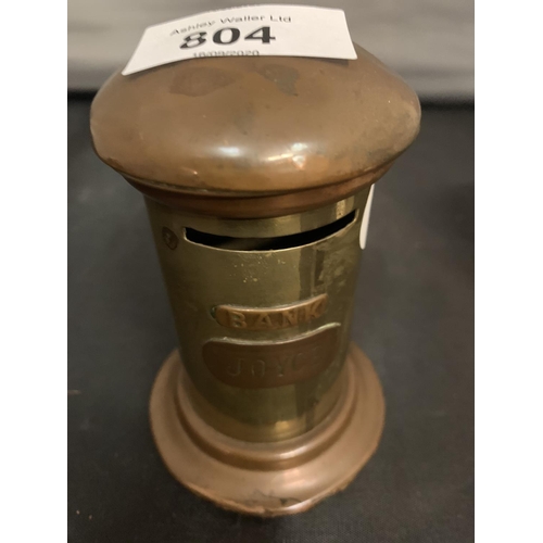 804 - A SMALL BRASS AND COPPER POST BOX MONEY BOX